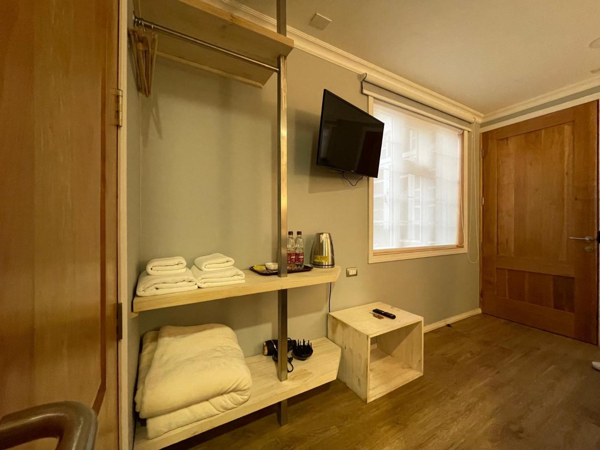 Hostal Boutique Puerta Roja Punta Arenas Bagian luar foto